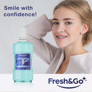 A bottle of Fresh&Go mouthwash displayed prominently with an image of a smiling woman wearing braces on her teeth and the words 'smile with confidence'.