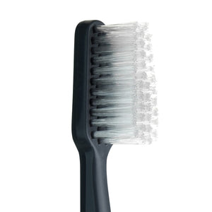 TePe Select Medium Toothbrush with tapered brush head and end-rounded filaments.